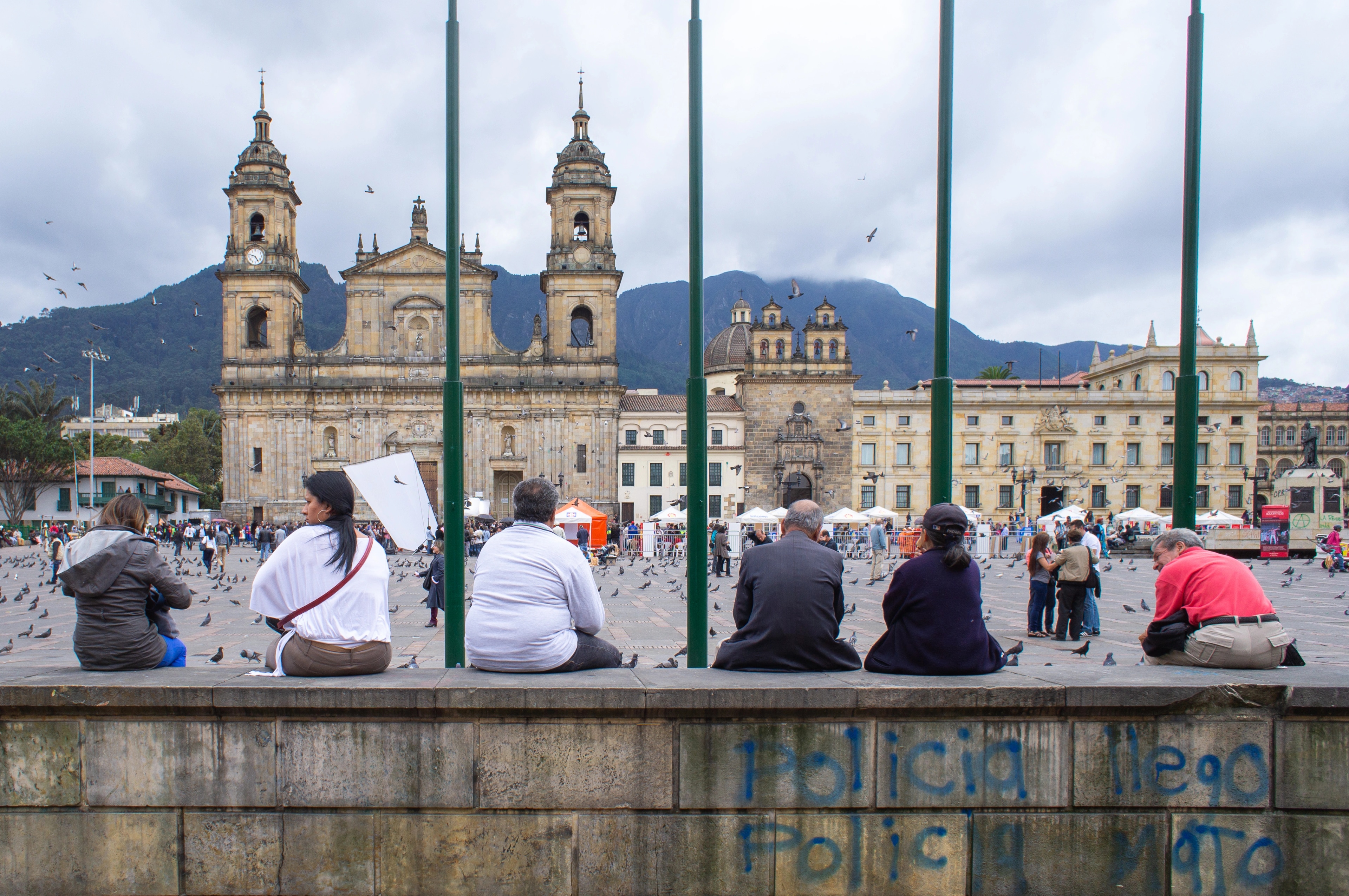 Scrawled across the wall, the graffiti reads, 'The cops arrived; the cops killed.'