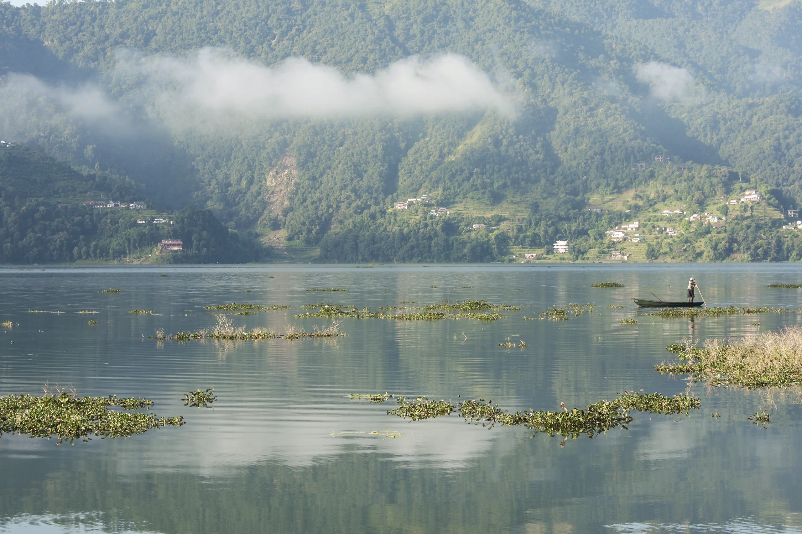 View from the lake Phewa and a fishing boat